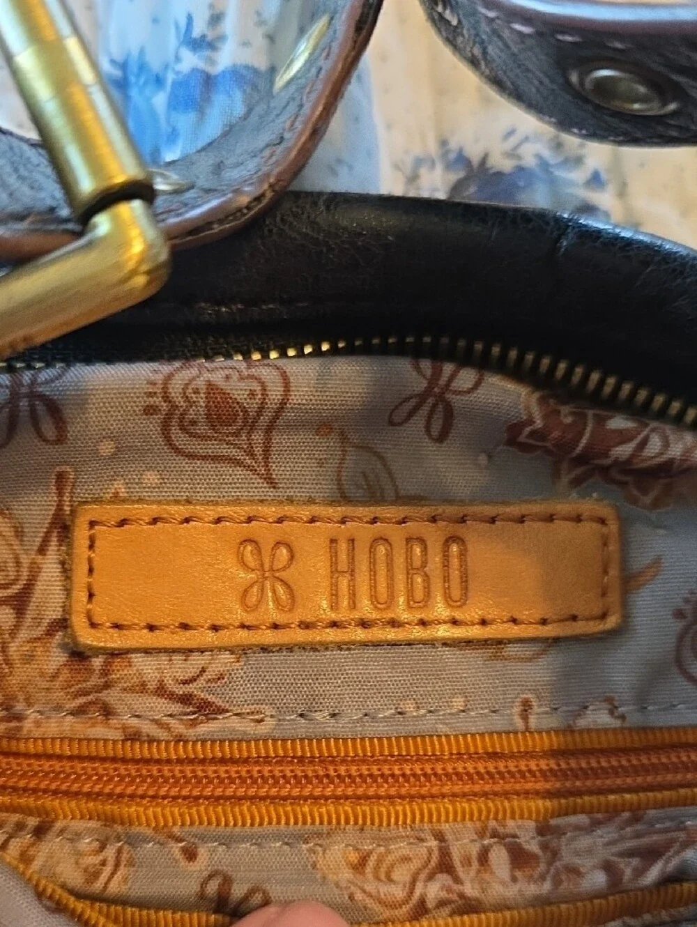 HOBO Black Leather Crossbody with Zip Accent and Decorative Adjustable Strap